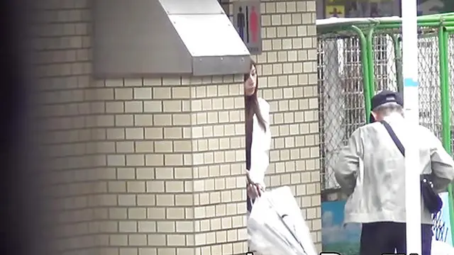 Japanese girls urinate in public toilet &mdash;  voyeuristic explicit footage