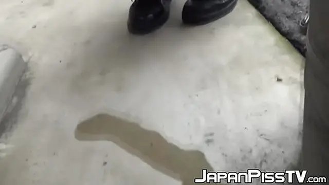 Teen Asian redhead caught peeing outside on camera